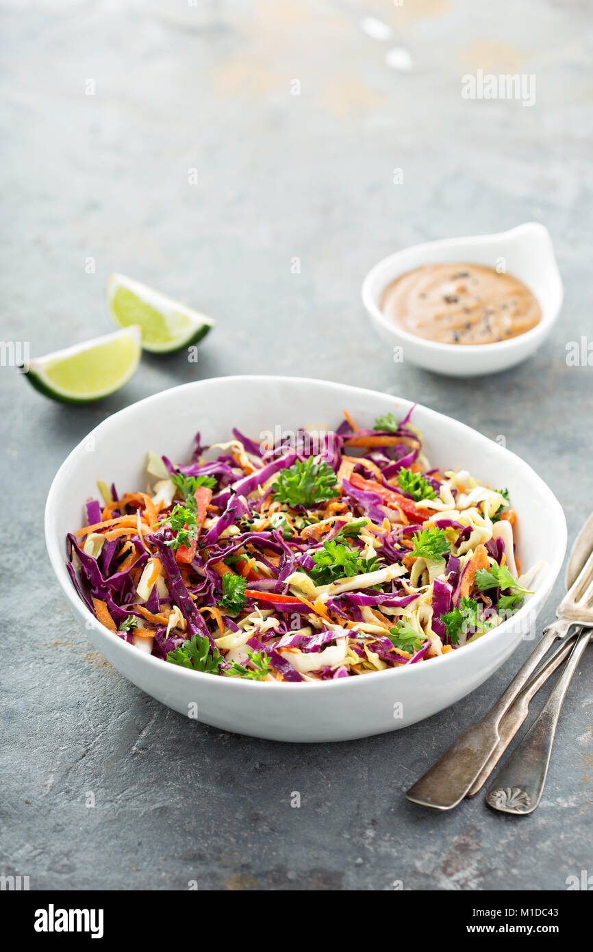 Asian cole slaw with peanut butter dressing Stock Photo
