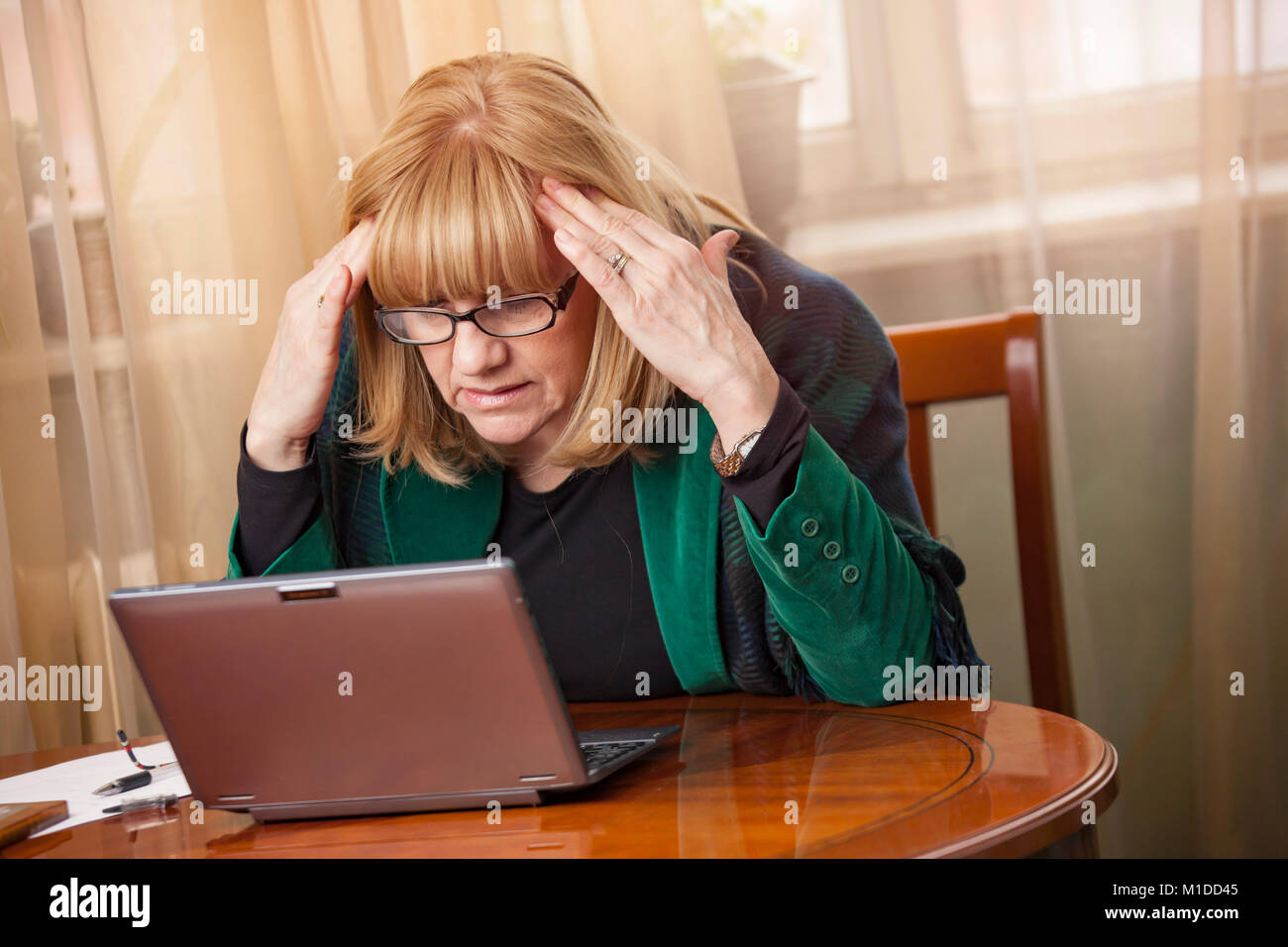 Stressful work at home Stock Photo