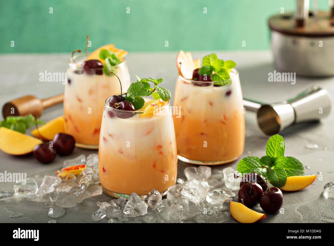 Summer cherry and peach coconut milk cocktail Stock Photo Alamy