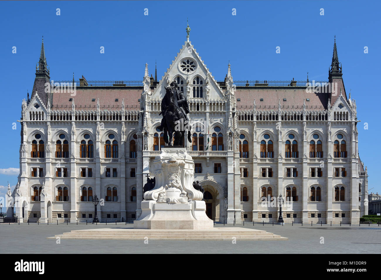 Hungarian Parliament building on the bank of the river Danube in Budapest with Equestrian statue of Andrassy - Hungary. Stock Photo