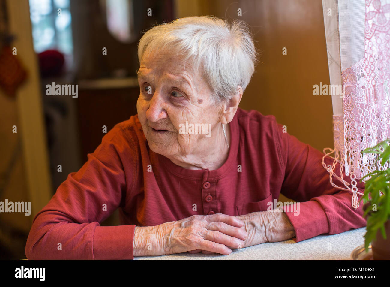 Very old woman lonely sad hi-res stock photography and images - Alamy