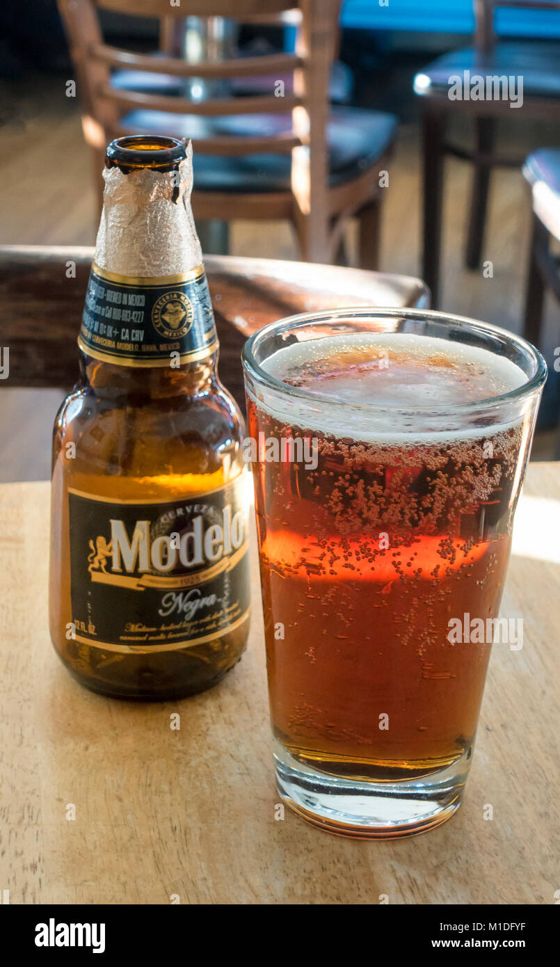 A bottle and glass of Negra Modelo Mexican beer Stock Photo