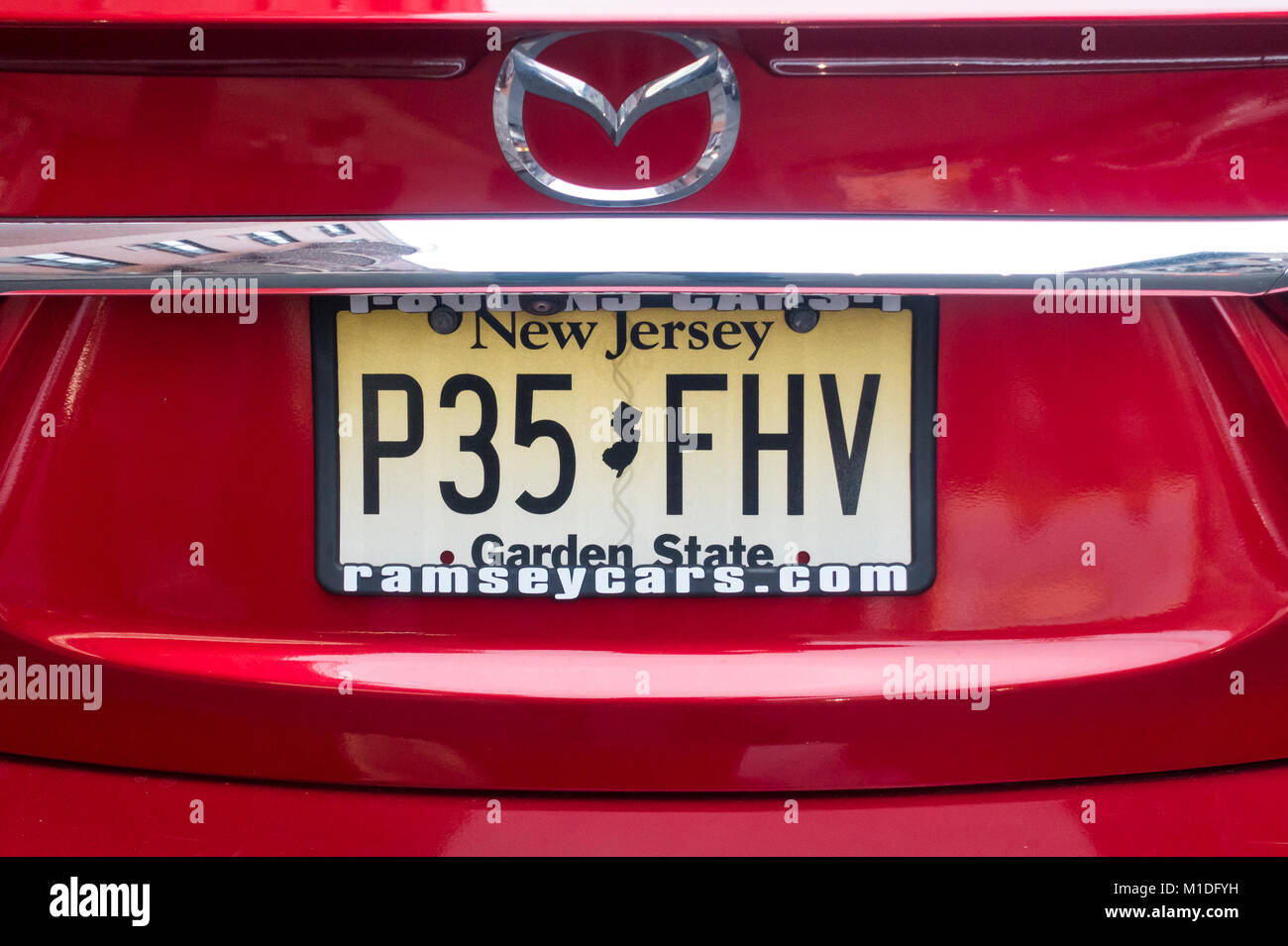 New Jersey License on a red Mazda 6 Stock Photo