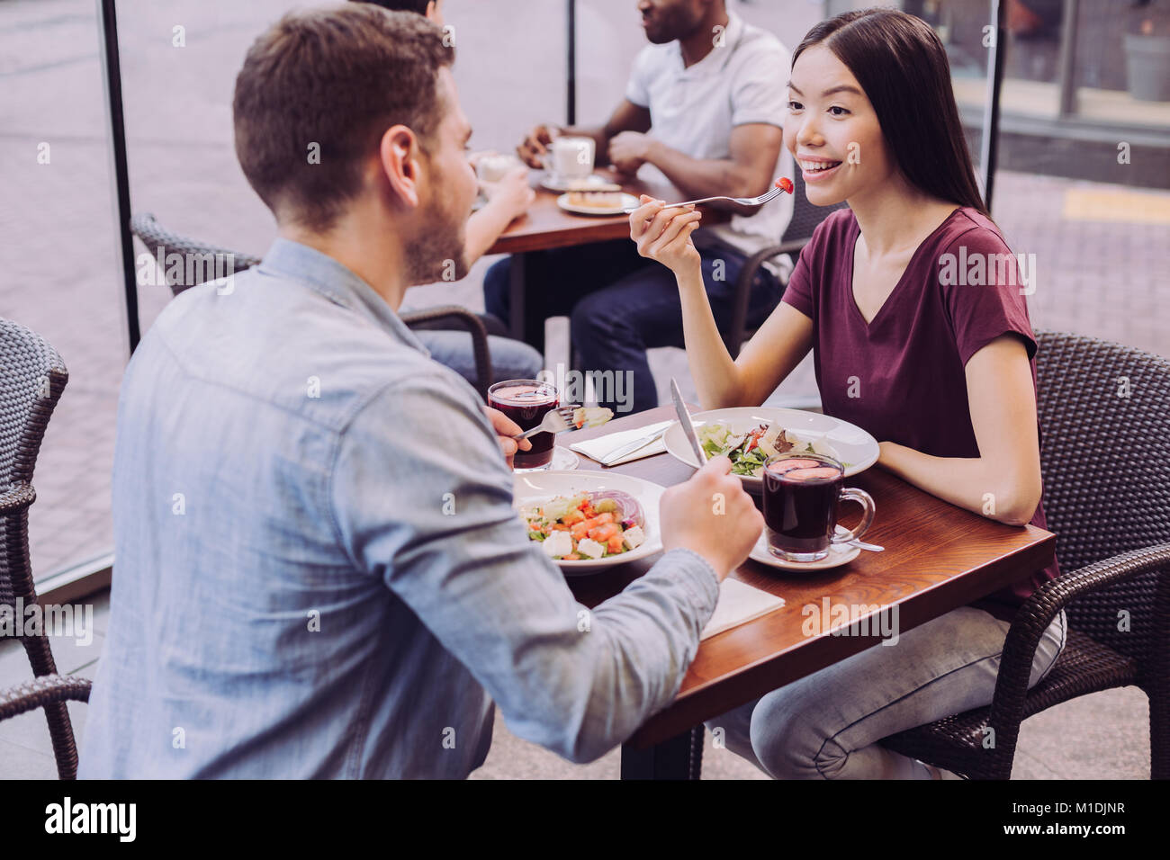 Pleasant tender couple resting at cafe Stock Photo Alamy