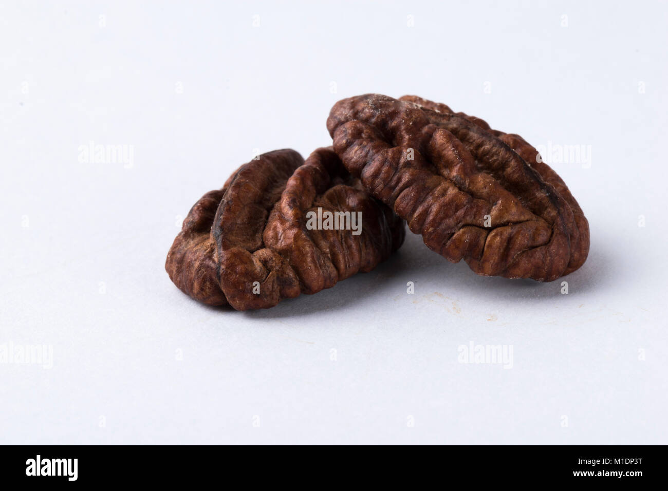 Pecan nuts isolated on white background Stock Photo