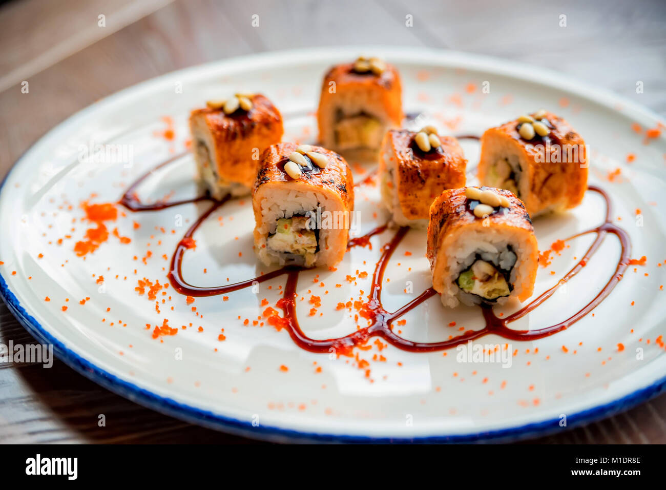Traditional japanese sushi rolls in restaurant Stock Photo - Alamy