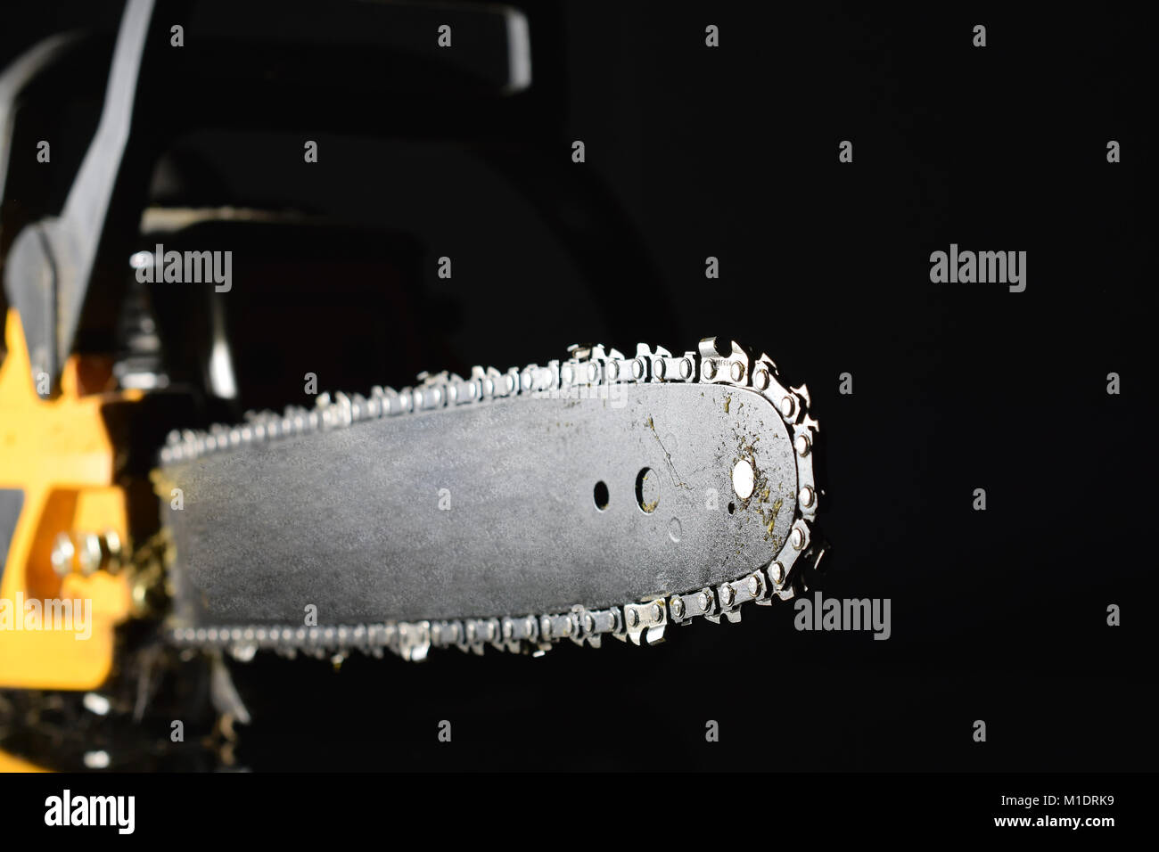 Chainsaw studio close up image. Shallow depth of field. Stock Photo