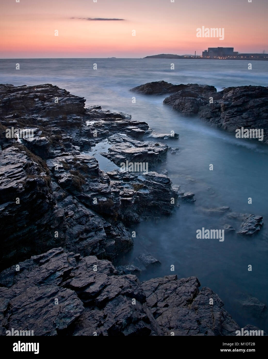 Wylfa nuclear power station from Cemlyn on the coast of Anglesey, North Wales Stock Photo