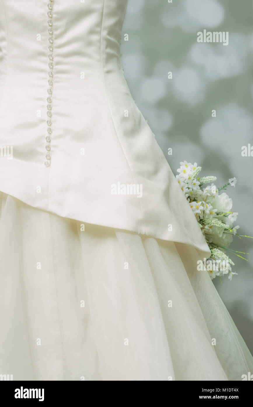 Detailing of traditional wedding dress Stock Photo