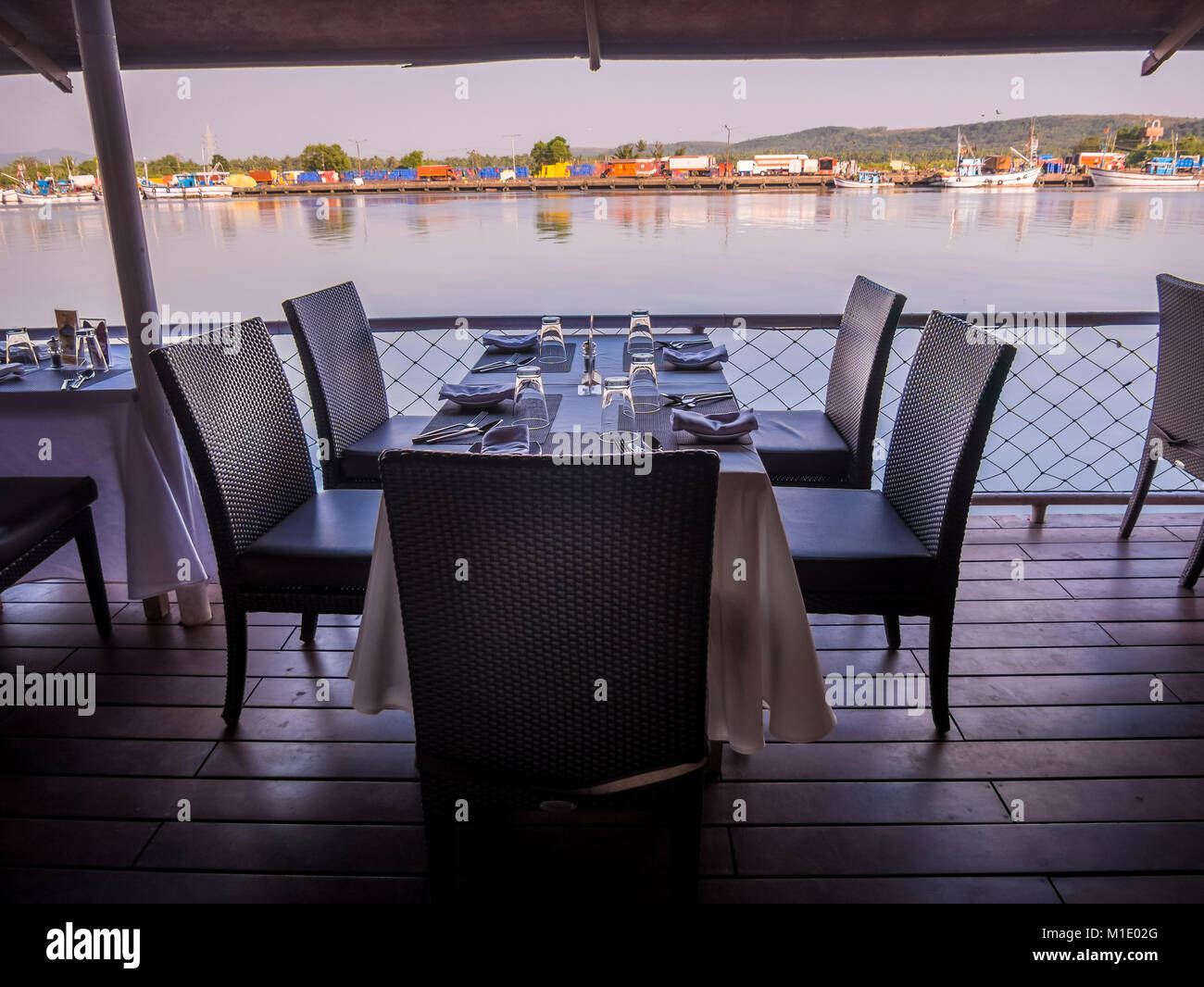 Restaurant table with empty glasses and basic dining set at Goa Restaurant Stock Photo Alamy