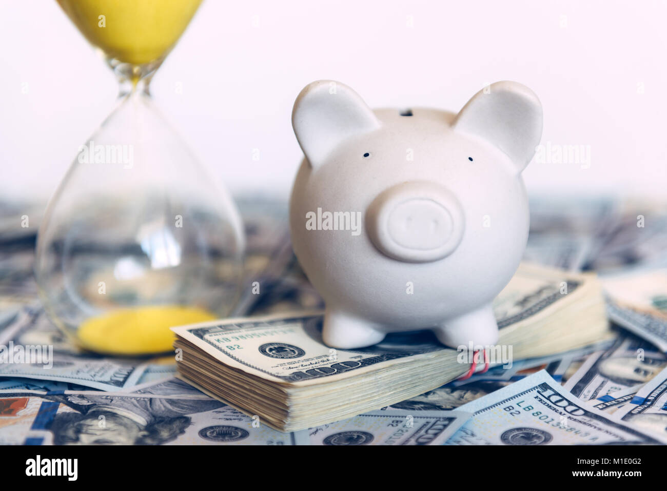 Piggy moneybox with dollar cash Stock Photo