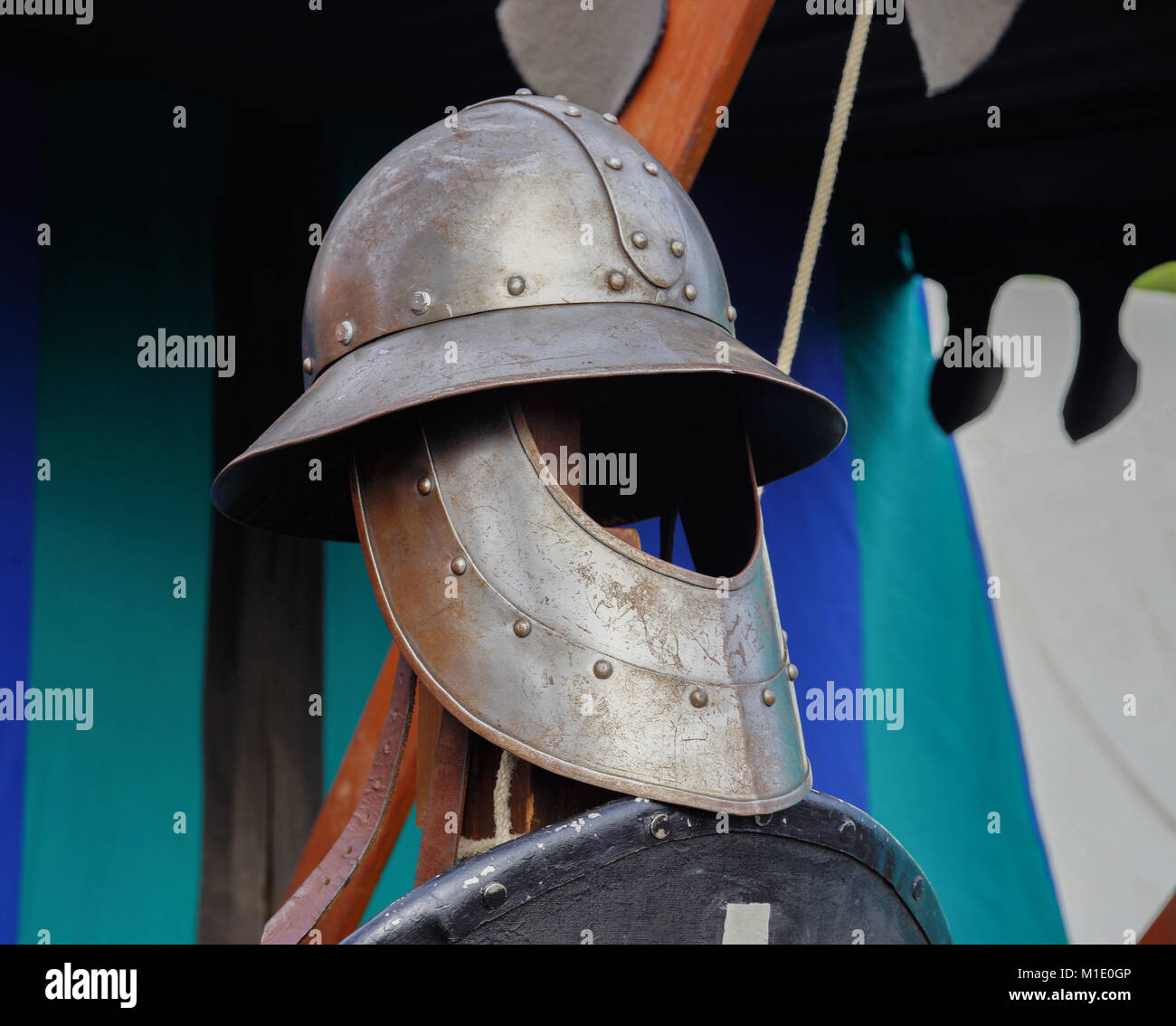 Arming of a medieval warrior. Seen of a medieval knight festival. Stock Photo