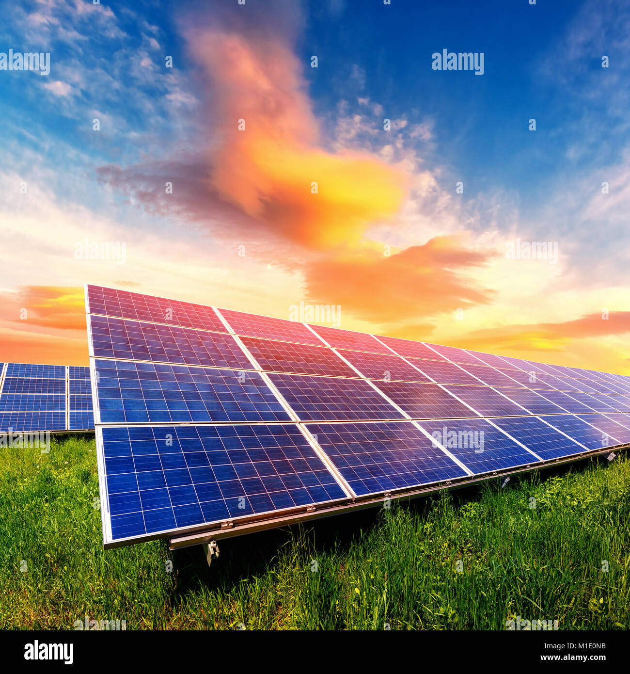 Solar panel on beautiful orange sundown background Stock Photo
