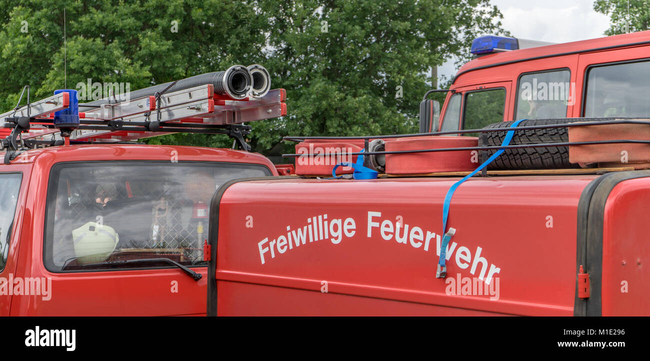 Detail of a fire truck with German lettering: volunteer fire department Stock Photo
