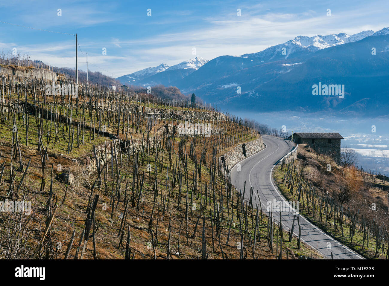 Swerving roads in Valtellina, a valley near Sondrio in the Lombardy region of northern Italy, bordering Switzerland Stock Photo