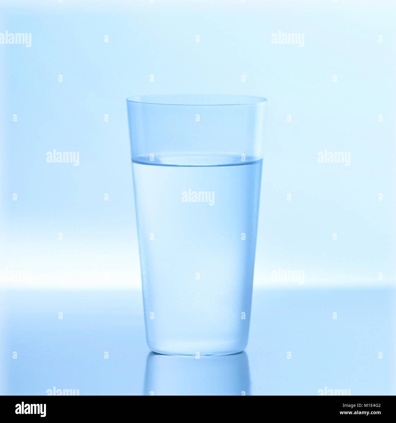 Glass of water on a table Stock Photo Alamy