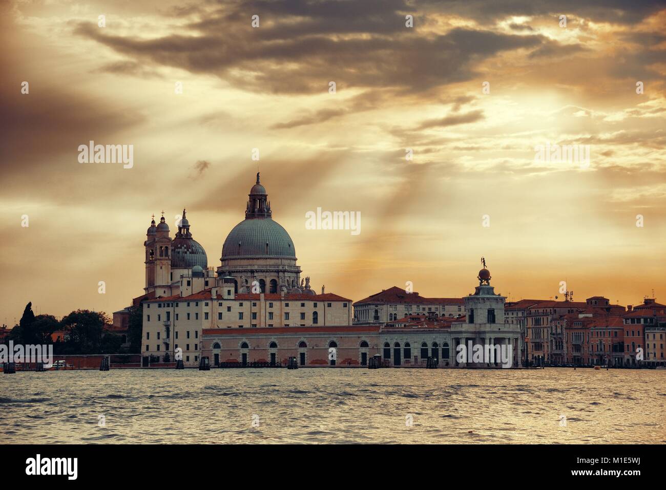 Venice Church Santa Maria della Salute at sunset in Italy Stock Photo ...