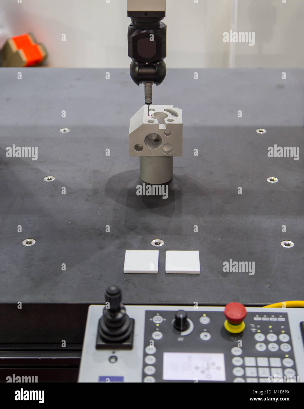 CNC Coordinate Measuring Robotic Machine measuring workpiece Stock Photo