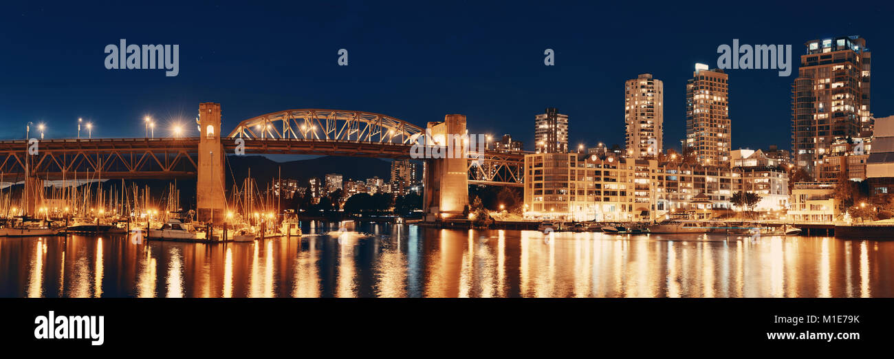 Vancouver False Creek at night with bridge and boat panorama Stock ...