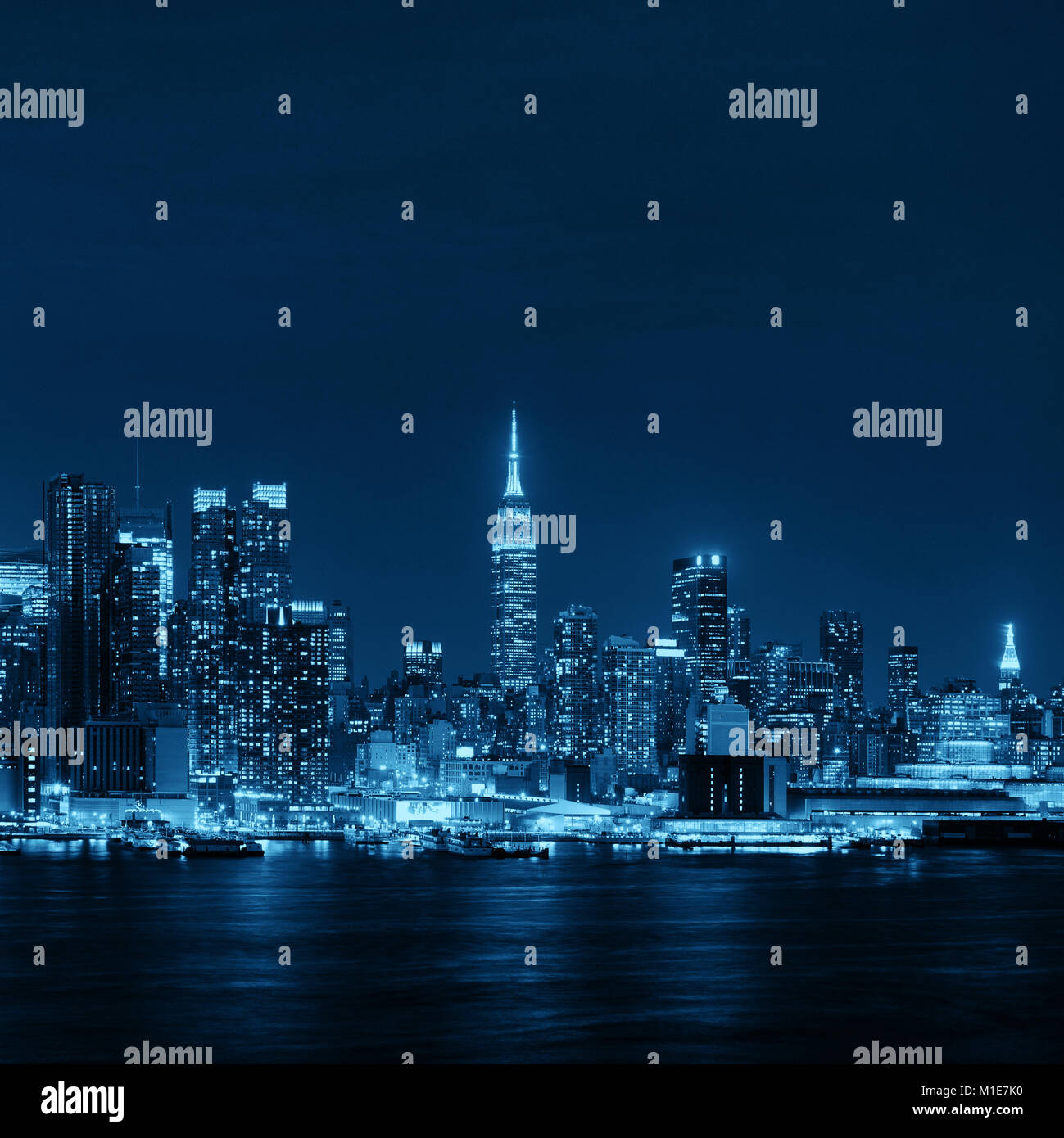Midtown skyline over Hudson River in New York City with skyscrapers at ...