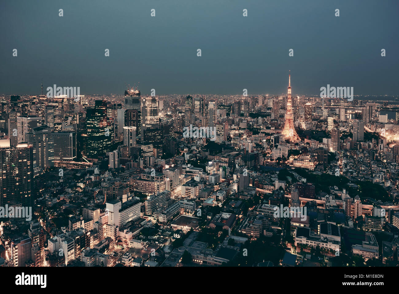Tokyo Tower and urban skyline rooftop view at night, Japan. Stock Photo