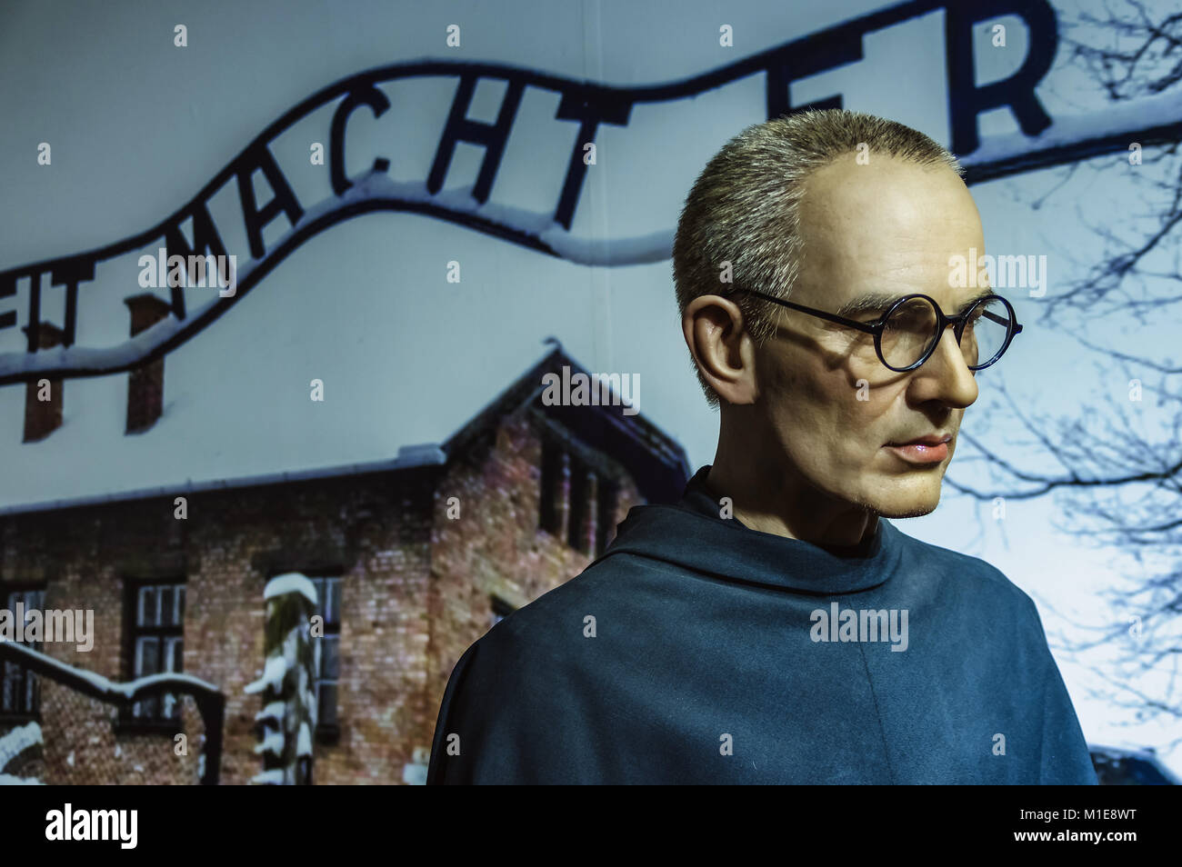 Wax statue of St Maximilian Maria Kolbe at the Krakow Wax Museum - Cracow, Poland. Stock Photo