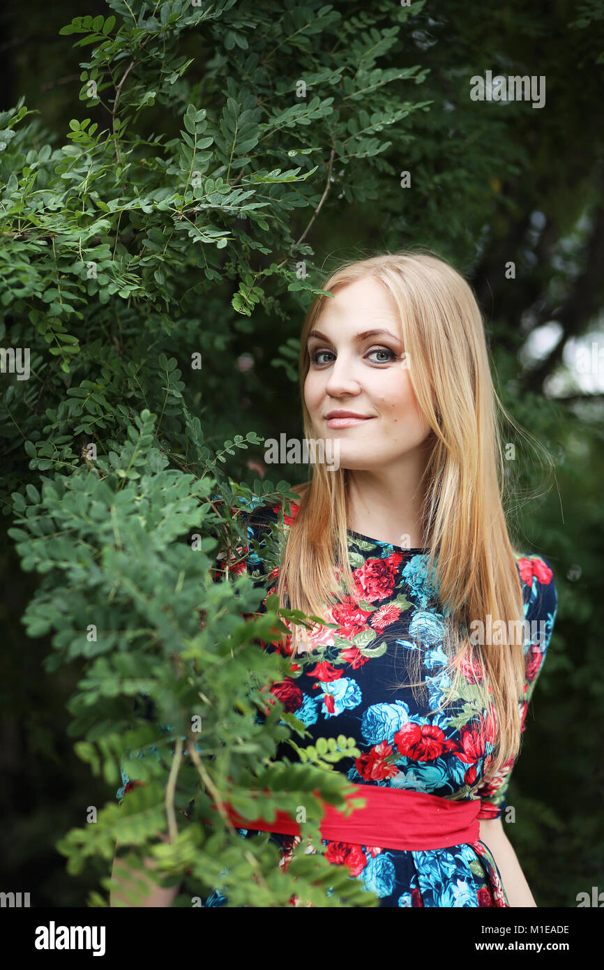 Girl in the street with an umbrella Stock Photo - Alamy