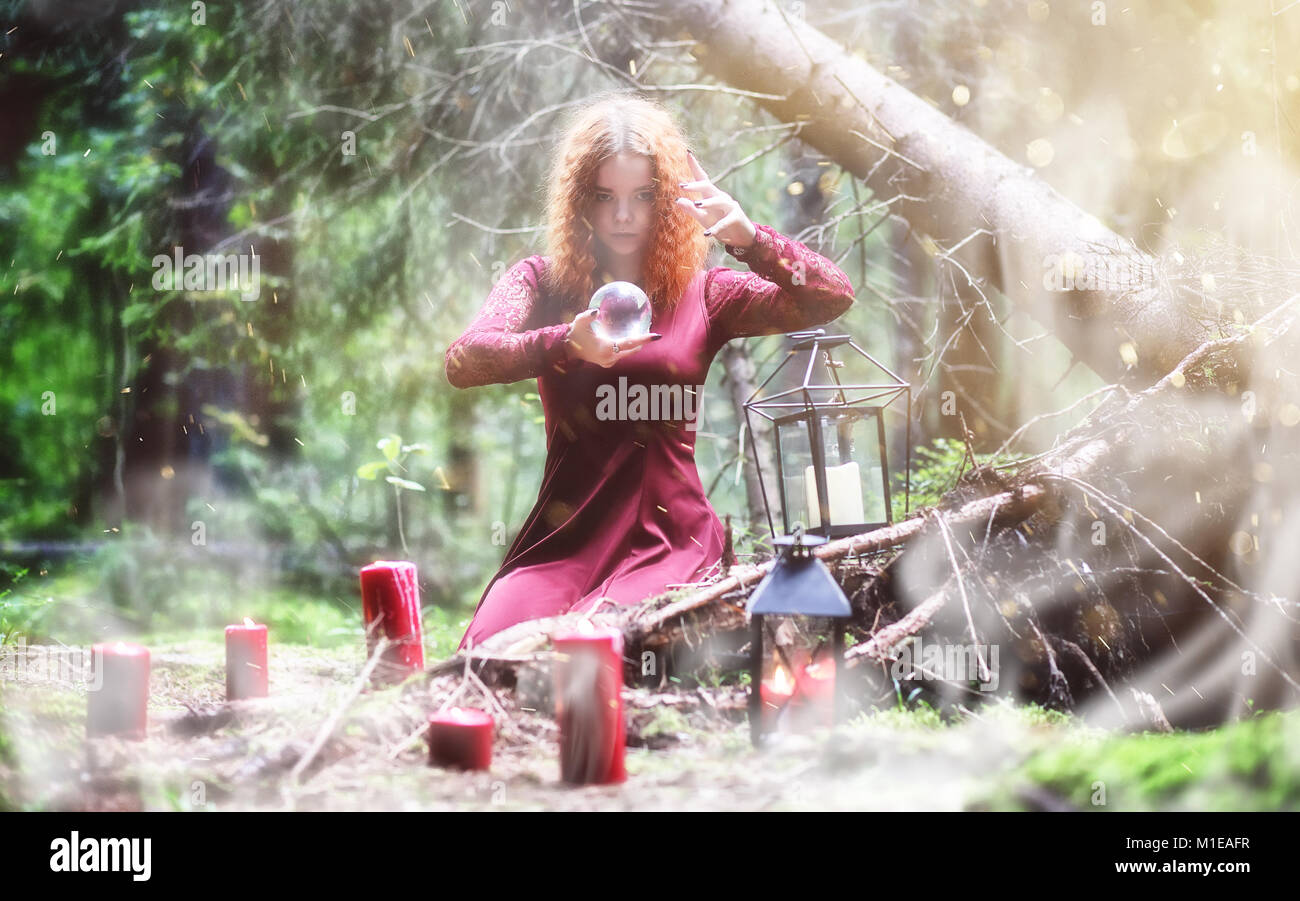 Witch Doing Rituals Witch ritual in a forest Stock Photo - Alamy