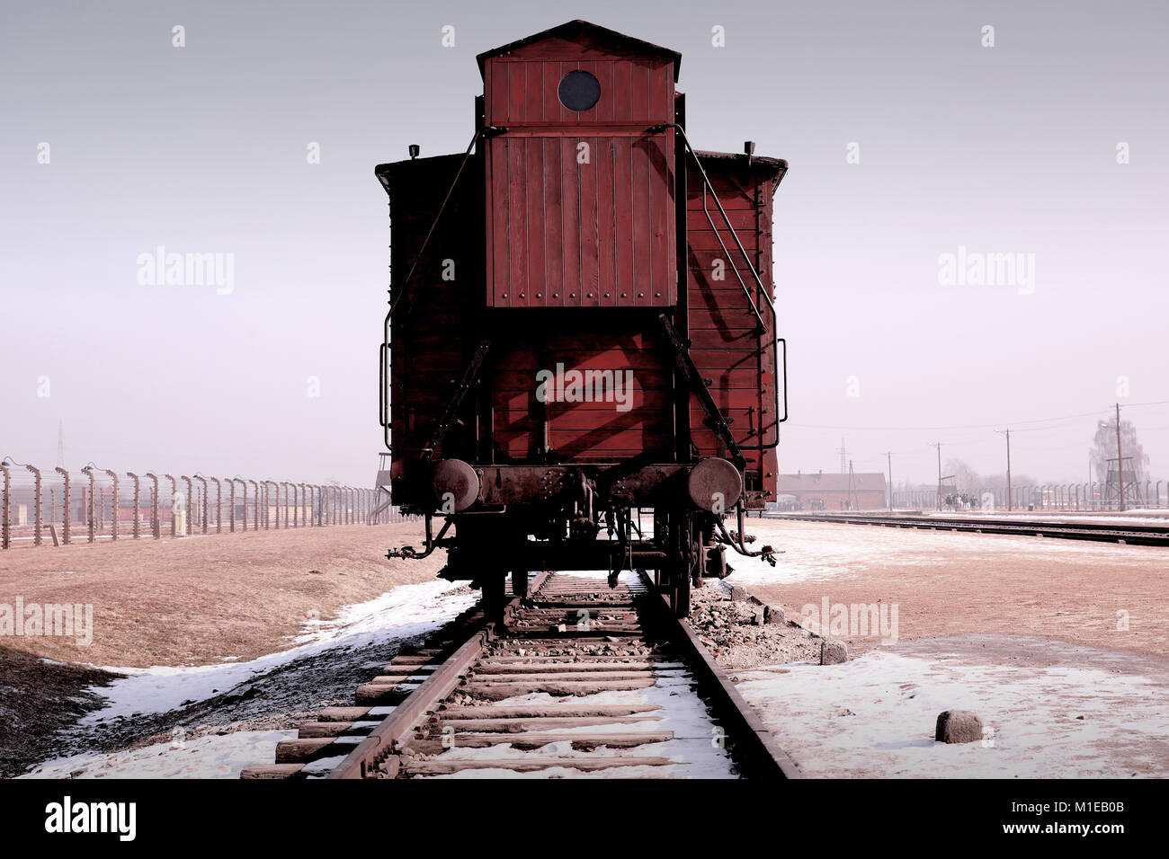 Original preserved Bllod Red Railway Carriage on Judenrampe Platform inside Auschwitz II - Birkenhau Musem site. Stock Photo