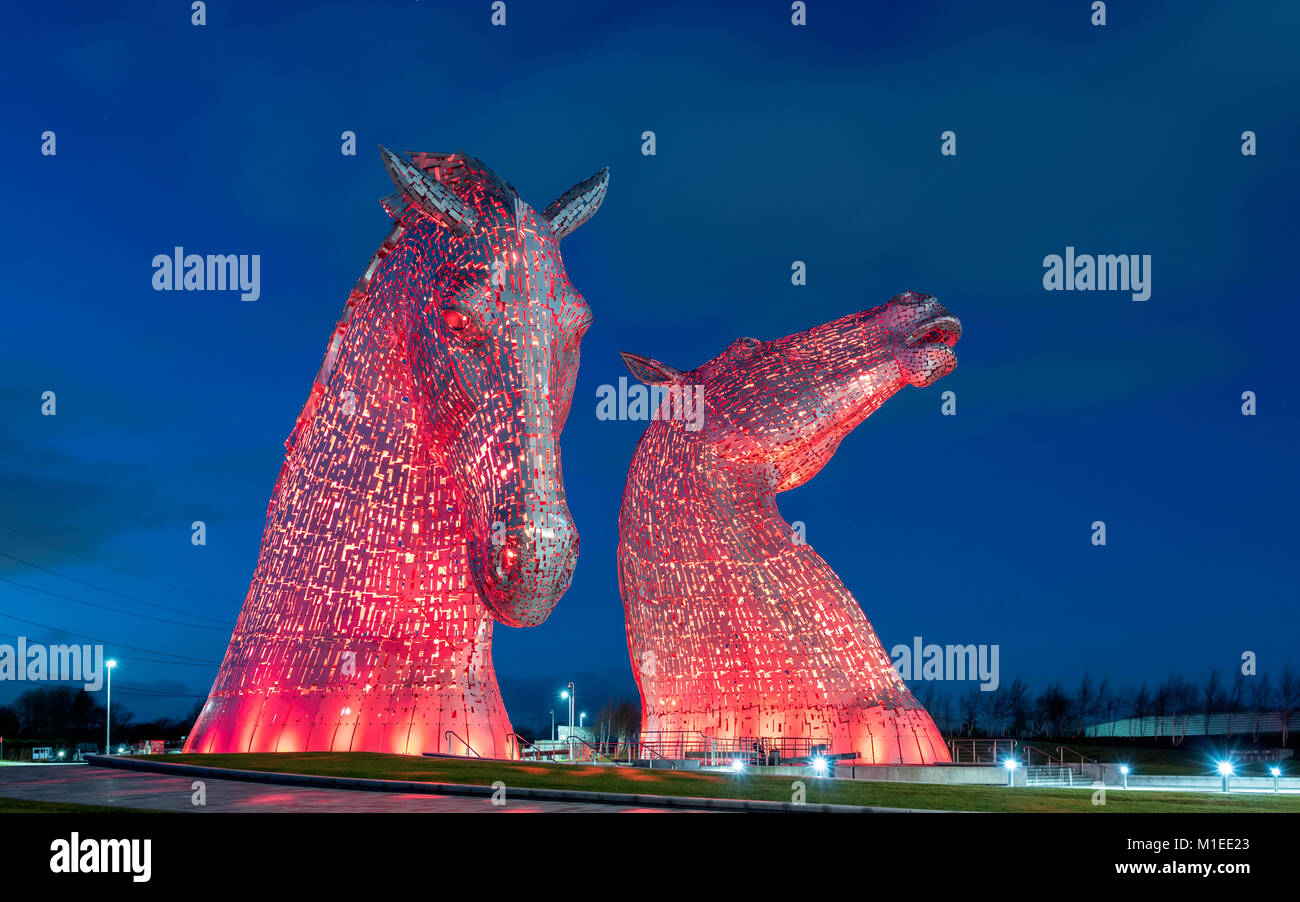 Night view of The Kelpies , large sculptures of horses, at Helix Park