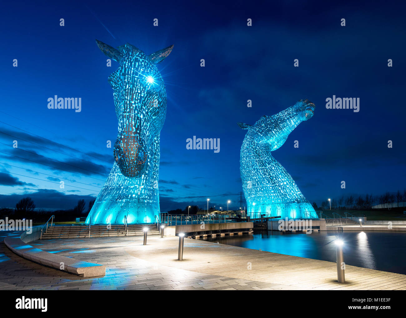 Night view of The Kelpies , large sculptures of horses, at Helix Park