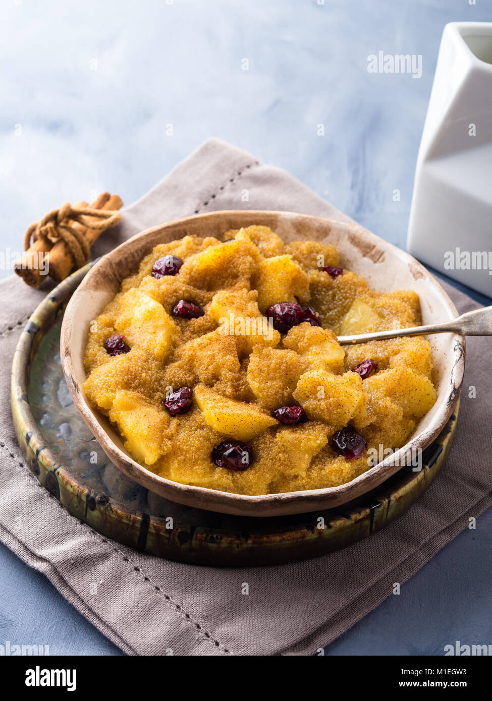Amaranth porridge with apples, cinnamon, turmeric and dried fruit