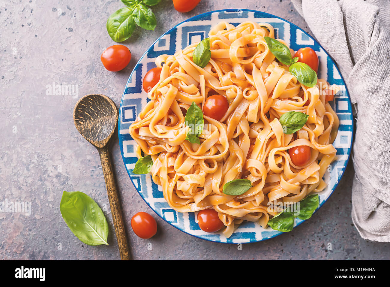 Pasta Fettuccine with tomato sauce Stock Photo - Alamy