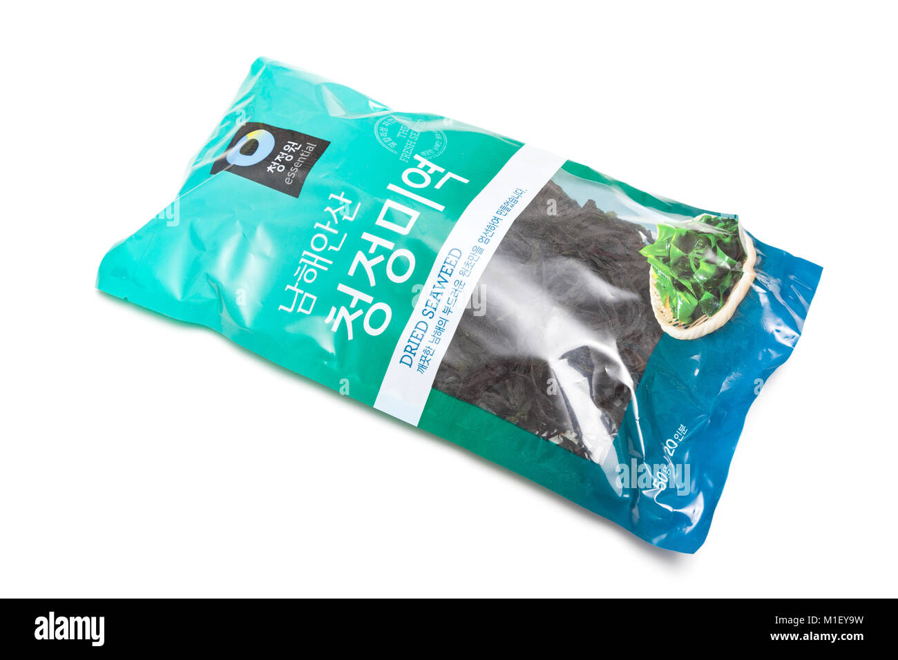 large packet of dried seaweed, isolated on a white studio background
