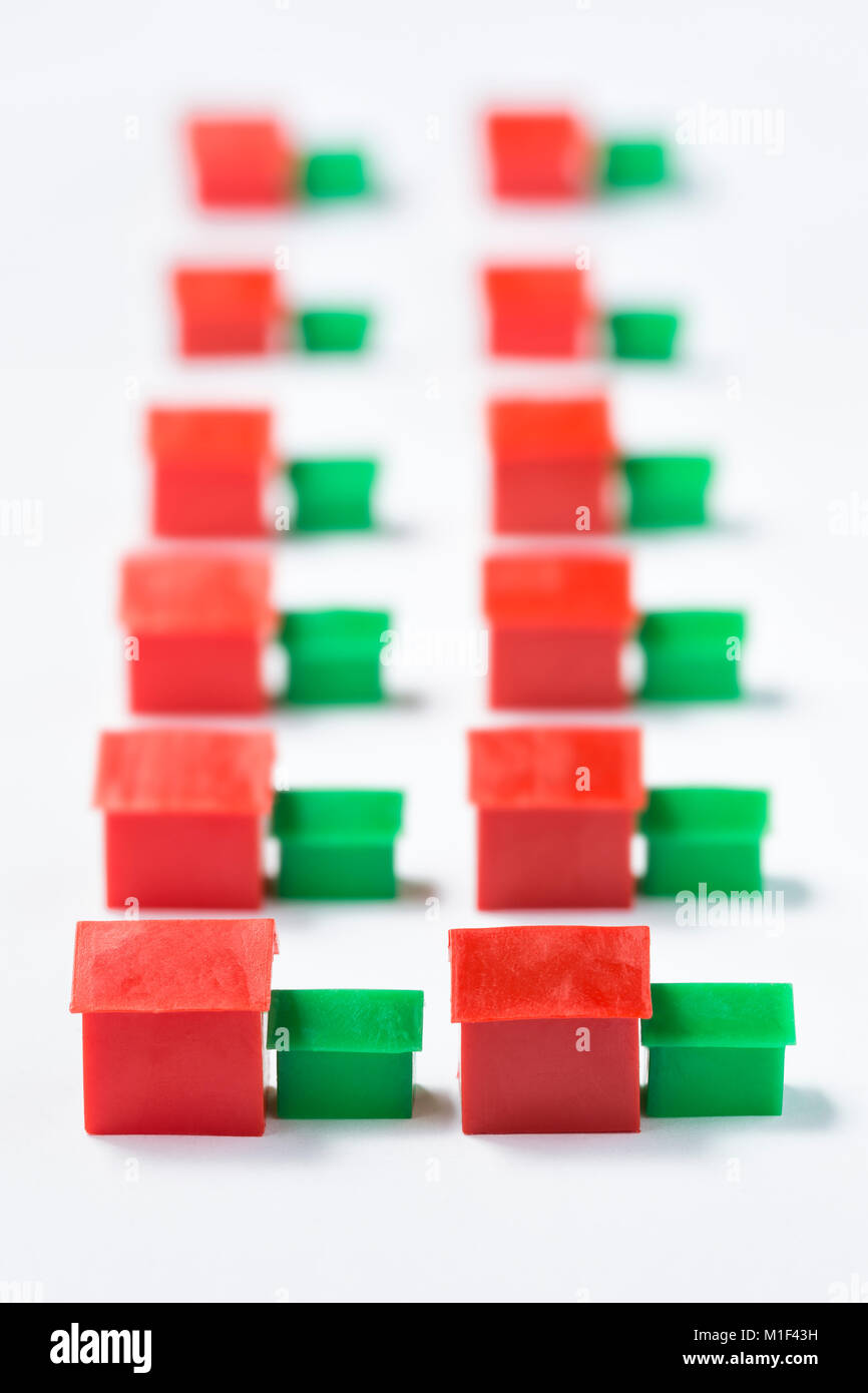 Plastic houses with garages. Stock Photo