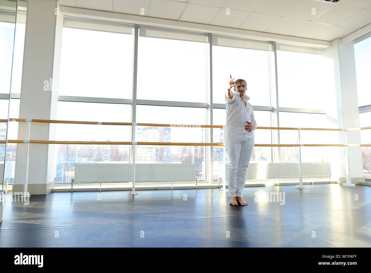Male dancer moves using street style elements Stock Photo Alamy