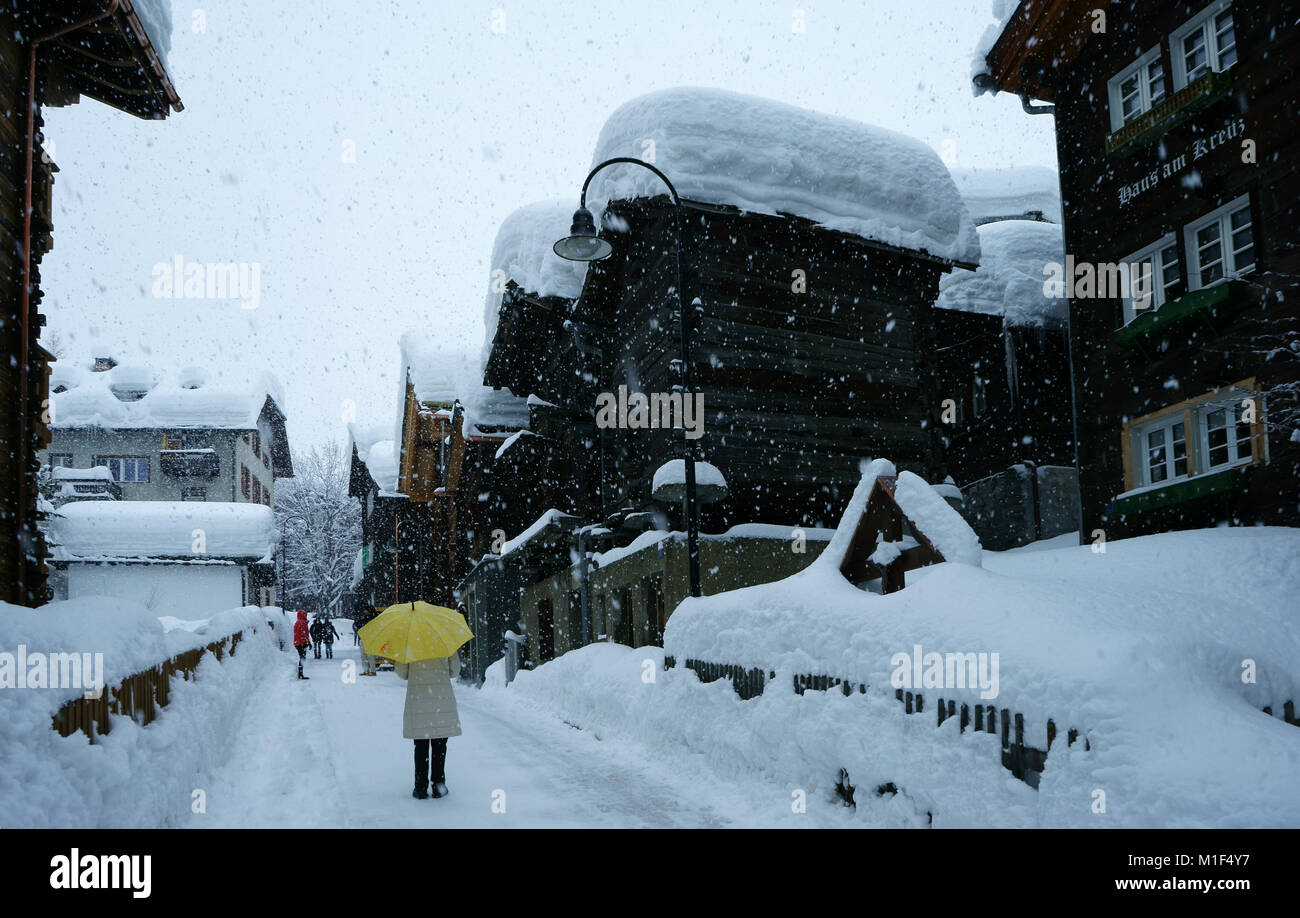 Town Zermatt with old log houses in historic part of town, winter, Valais, Switzerland Stock Photo