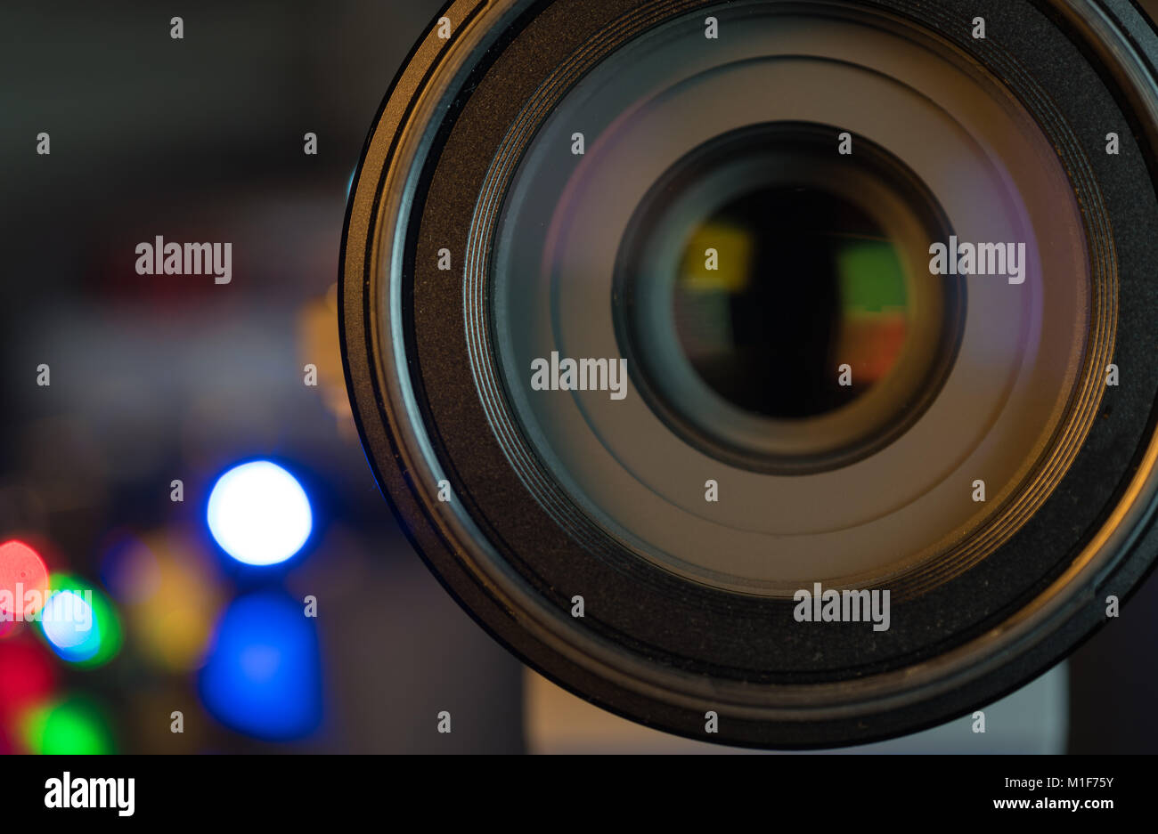 Camera Grey Reflection The photo or videocamera lens on dark background with lense reflections ...