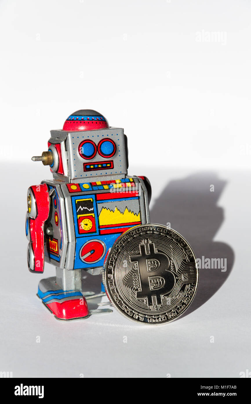 Vintage tin toy robot with bitcoin coin, cryptocurrency mining concept  Stock Photo - Alamy
