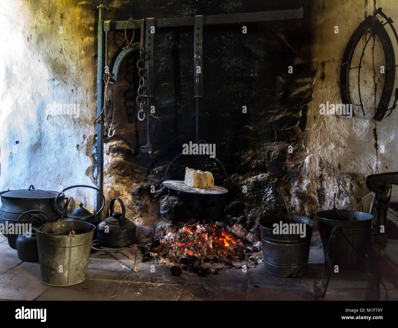 Cooking on an old-fashioned griddle Stock Photo