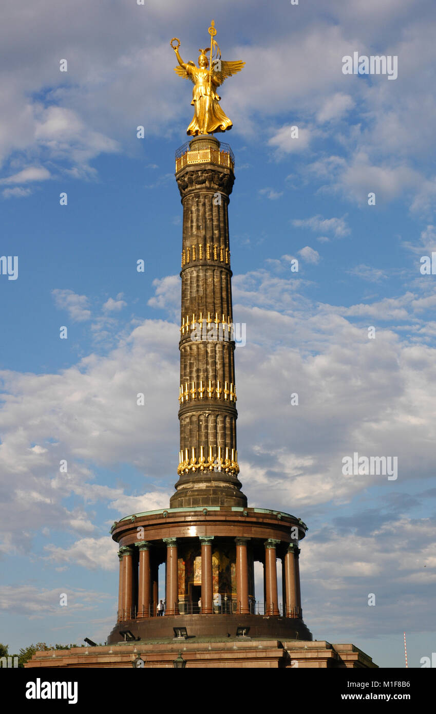 Germany. Berlin Victory Column. Designed by the German architect Heinrich Strack (1805-1880), after 1864. It commemorates the Prussian victory in the Danish-Prussian War although, as the monument was inaugurated in 1873, Prussia has also victorious in the Austro-Prussian War and in the Franco-Prussian War. On the top, is a bronze sculpture of Victoria, designed by the German sculptor Friedrich Drake (1805-1882). Tiergarten Park. Stock Photo