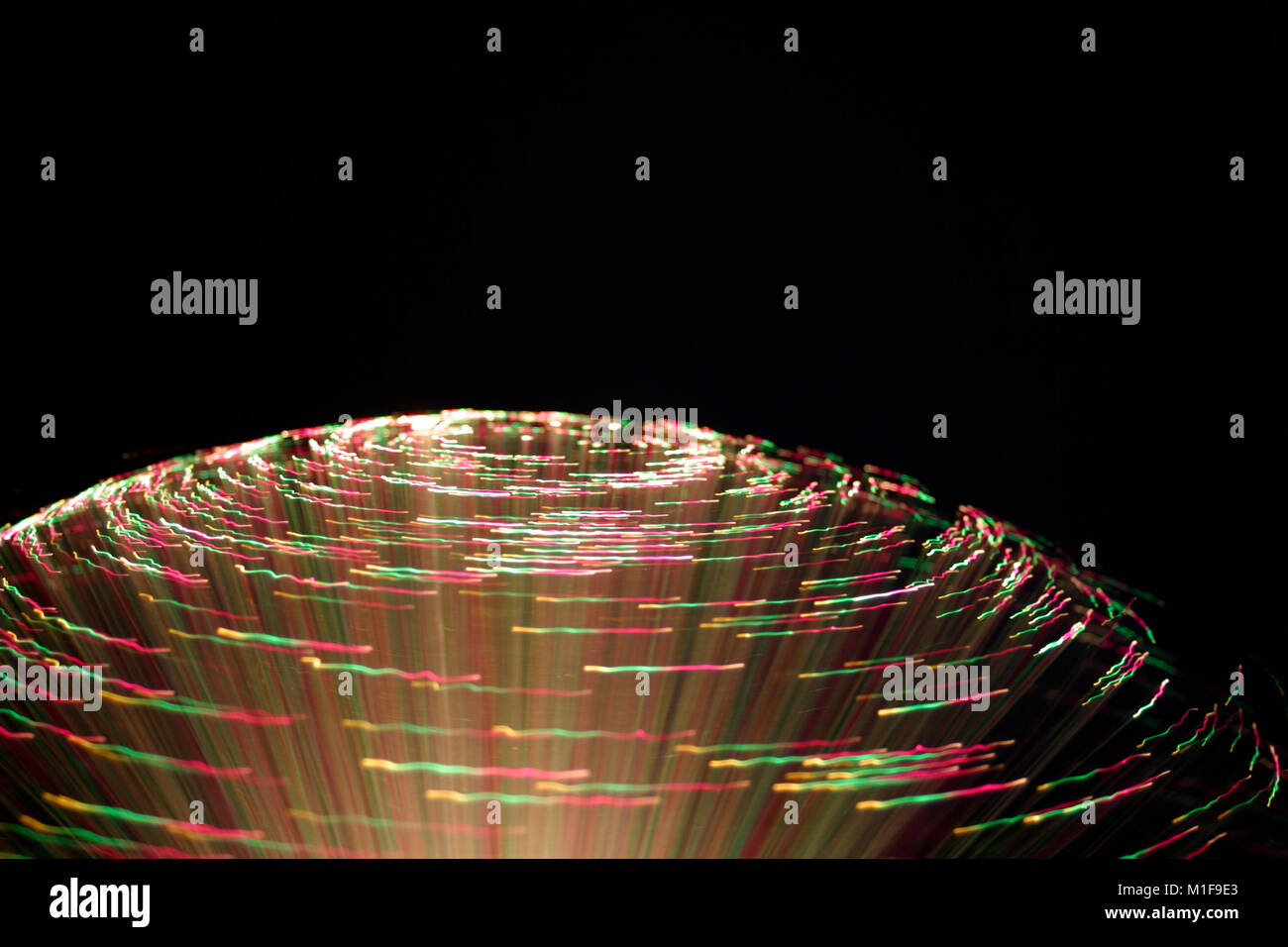Fibre optic lamps, multi-coloured abstract on black background Stock Photo