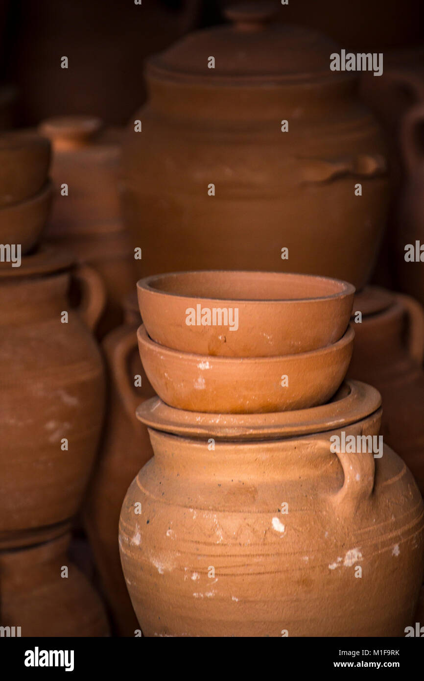 many clay pot make mud pottery on potters wheel. creating pots by shaping air  drying clay with both hands. mold with clay. practicing with modeling Stock  Photo - Alamy