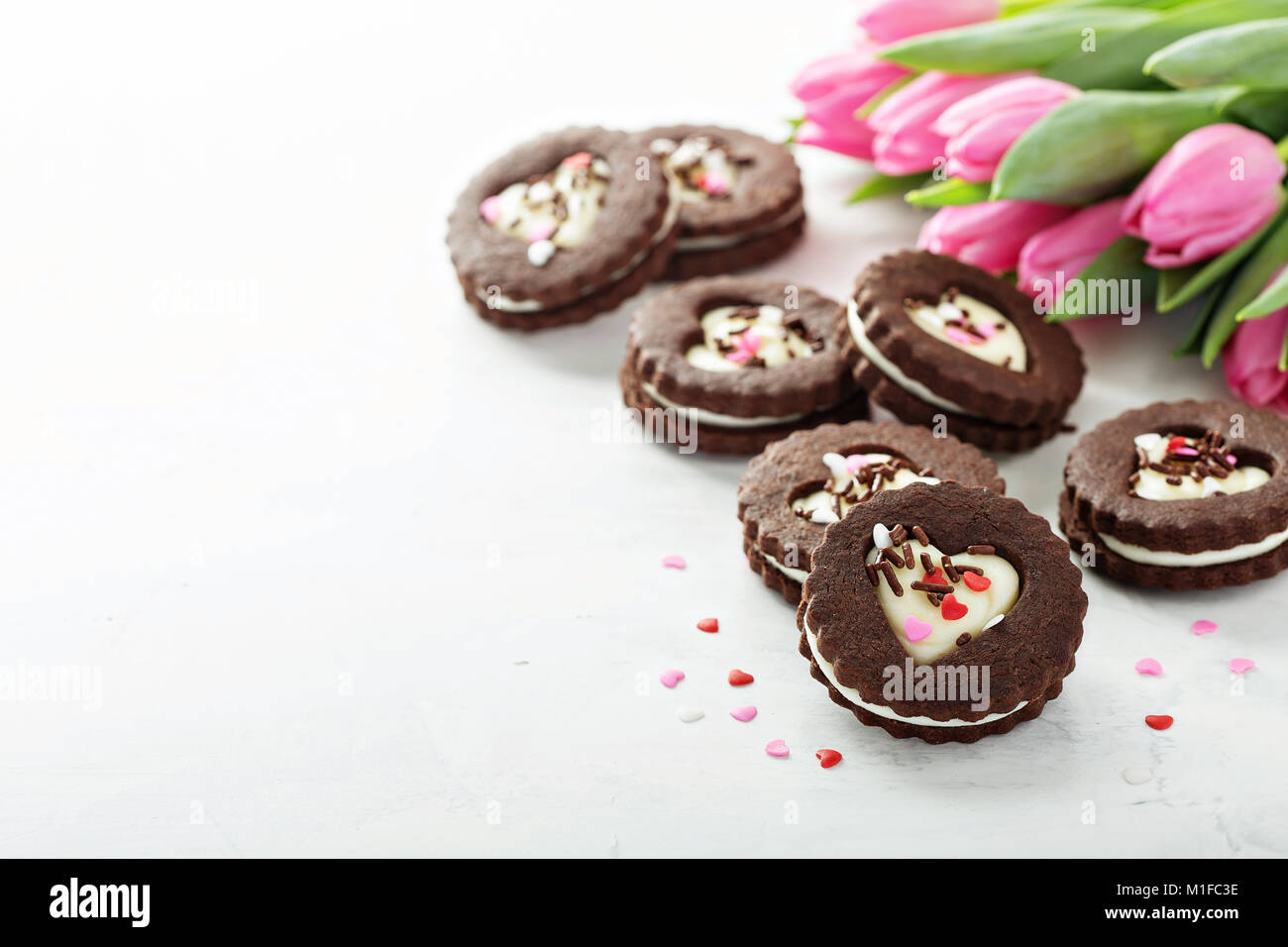Chocolate cookie sandwiches with cream cheese filling for Valentines