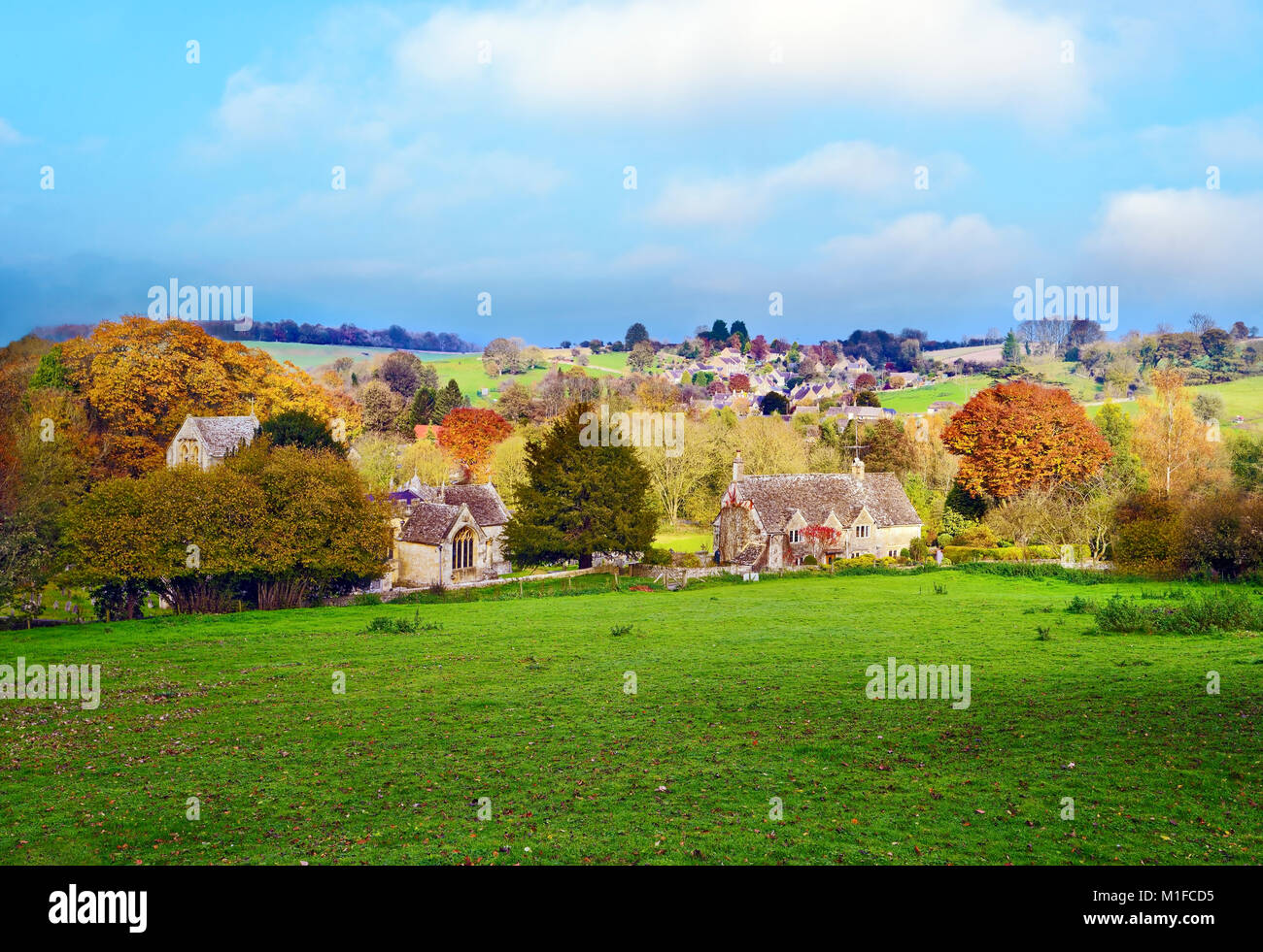 An autumn view of North Cerney, a traditional Cotswolds village. Stock Photo