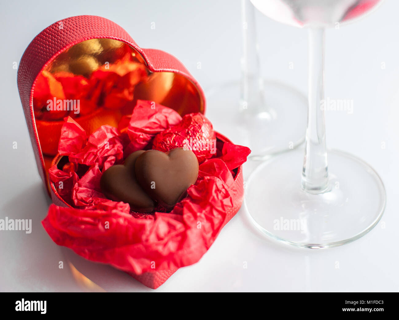 Heart Shaped Box With Red Roses Chocolate And Champagne