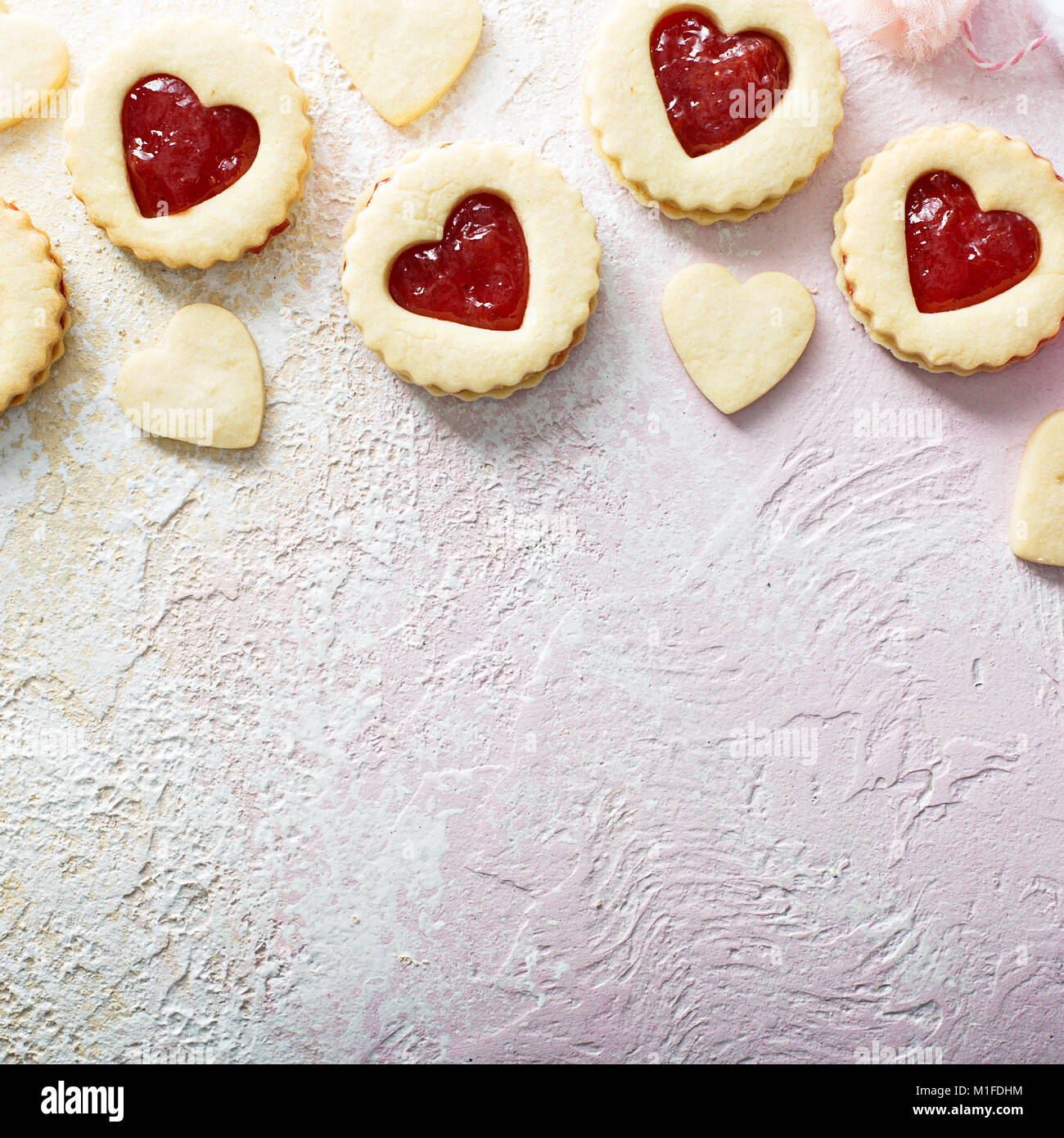 Vanilla cookies with strawberry jelly filling for Valentines Day with