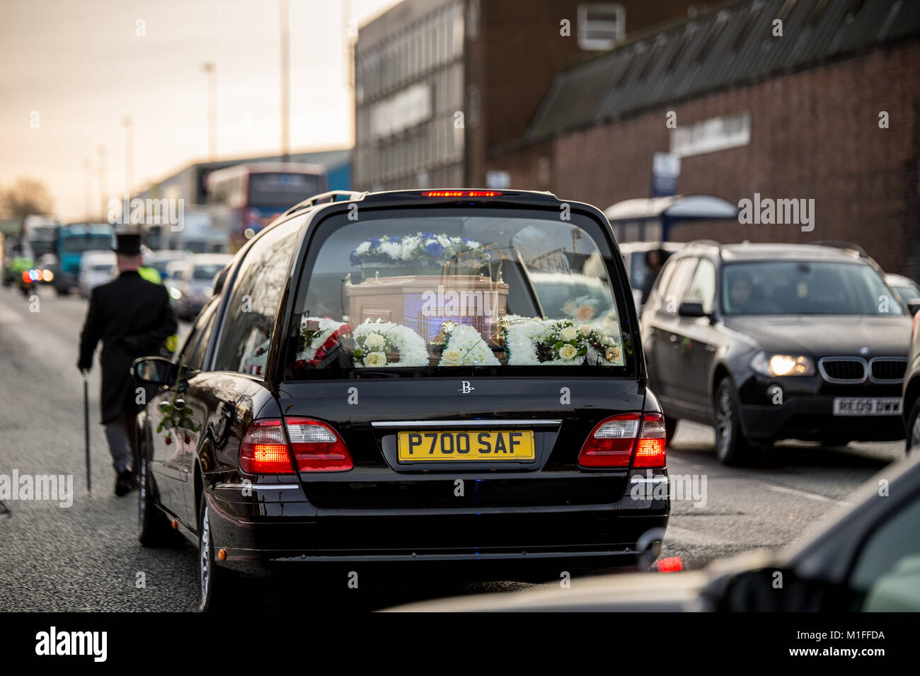 West Bromwich, UK. 30th Jan, 2018. Cyril Regis funeral cortege arrives at West Bromwich Albions Football ground The Hawthorns, where huge crowds have gathered to pay their respects to a football legend. Several ex players and managers attended Stock Photo