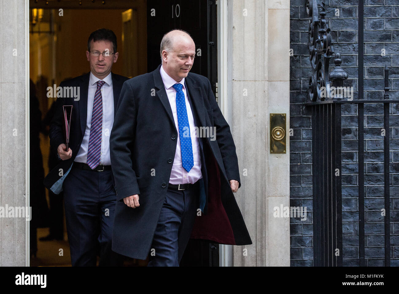 London, UK. 30th January, 2018. Chris Grayling MP, Secretary of State for Transport, and Jeremy Wright MP QC, Attorney General, leave 10 Downing Street following a Cabinet meeting. Credit: Mark Kerrison/Alamy Live News Stock Photo