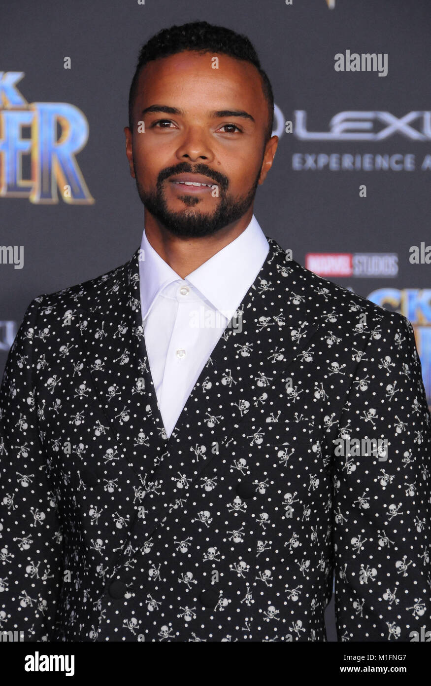 LOS ANGELES, CA - JANUARY 29: Actor Eka Darville attends the World Premiere of Marvel Studios' 'Black Panther' at Dolby Theatre on January 29, 2018 in Los Angeles, California. Photo by Barry King/Alamy Live News Stock Photo